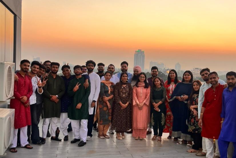 The Klocrix team on the rooftop at sunset